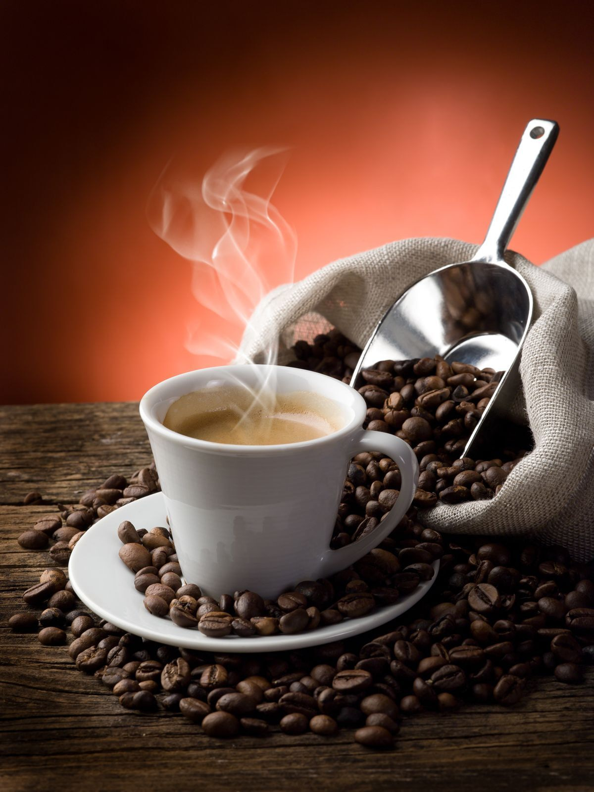 Steaming coffee among beans — full design